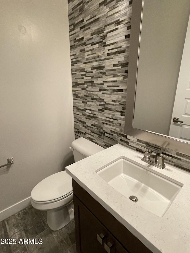 1840 S Follett Way, Gilbert, AZ 85295 - half bath featuring toilet, vanity, and baseboards