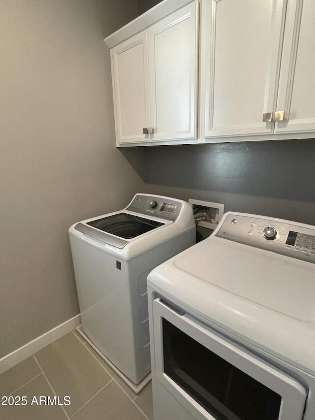 1840 S Follett Way, Gilbert, AZ 85295 - clothes washing area featuring washing machine and clothes dryer, cabinet space, tile patterned floors, and baseboards