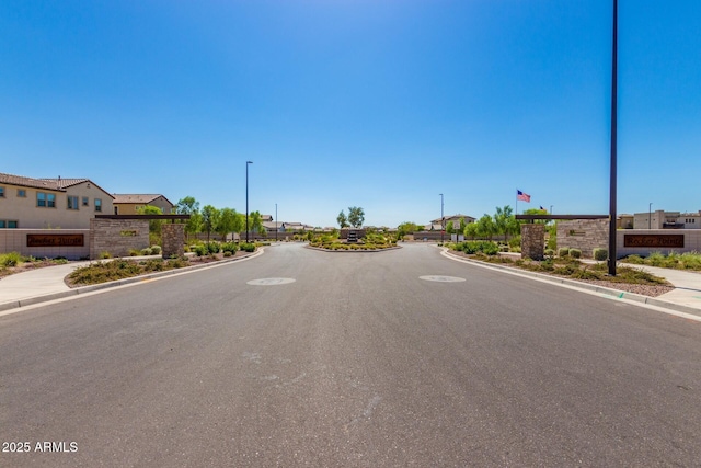 1840 S Follett Way, Gilbert, AZ 85295 - view of asphalt road featuring sidewalks, curbs, and a residential view