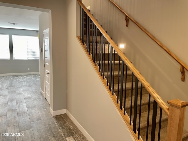 1840 S Follett Way, Gilbert, AZ 85295 - stairs with baseboards and wood finished floors