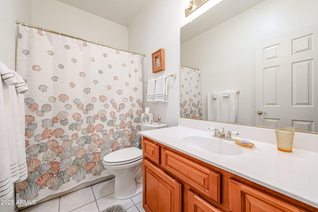 full bath featuring toilet, tile patterned flooring, and vanity