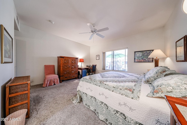 bedroom featuring a ceiling fan and carpet