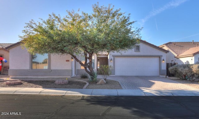 view of front of property with a garage