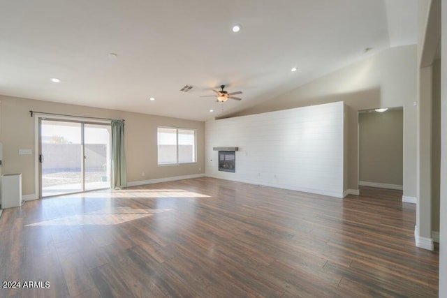 unfurnished living room featuring ceiling fan, dark hardwood / wood-style flooring, and lofted ceiling