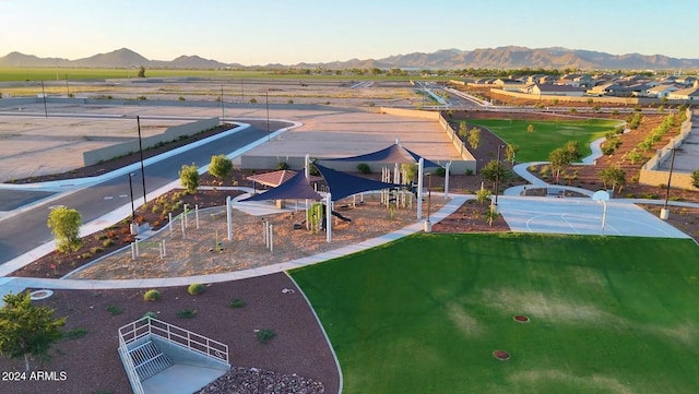 birds eye view of property with a mountain view