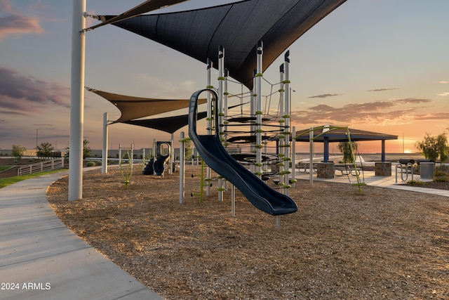 playground at dusk with a water view