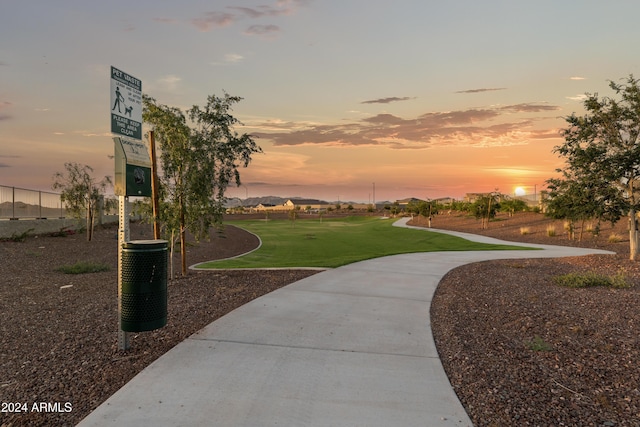 surrounding community featuring a yard