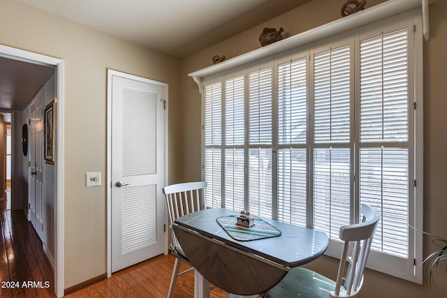 dining space featuring hardwood / wood-style flooring