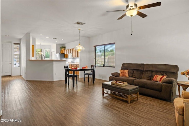 8237 W Alex Ave, Peoria, AZ 85382 - living area featuring visible vents, wood finished floors, baseboards, ceiling fan, and recessed lighting