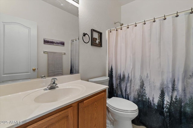 8237 W Alex Ave, Peoria, AZ 85382 - full bath featuring vanity, curtained shower, and toilet