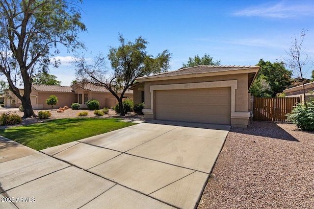 8237 W Alex Ave, Peoria, AZ 85382 - view of front of home featuring fence, a front yard, stucco siding, concrete driveway, and an attached garage