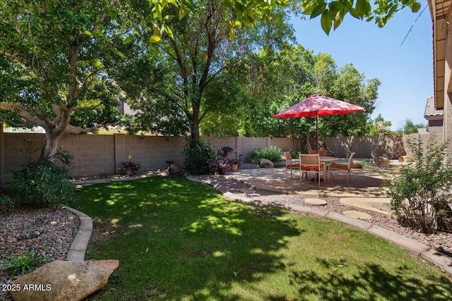 8237 W Alex Ave, Peoria, AZ 85382 - view of yard with a fenced backyard and a patio area