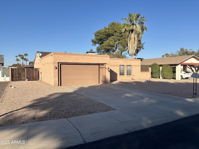 single story home featuring a garage