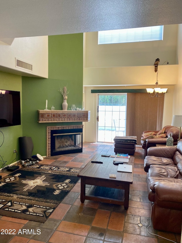 living room with a high ceiling