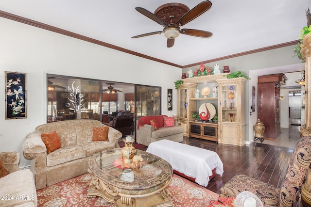 living room with crown molding, wood-type flooring, and ceiling fan