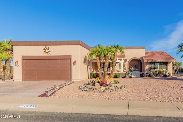 view of front of property with a garage