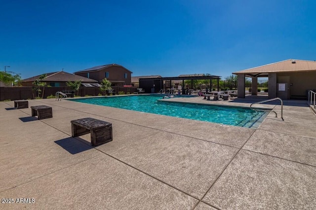 view of swimming pool featuring a patio