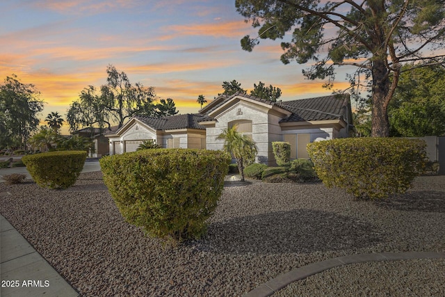 view of front of home with a garage