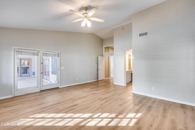 unfurnished room with ceiling fan, high vaulted ceiling, and light hardwood / wood-style flooring