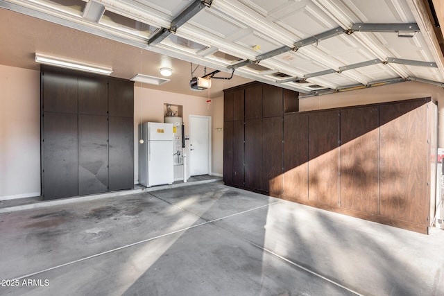 garage featuring a garage door opener, gas water heater, and white refrigerator