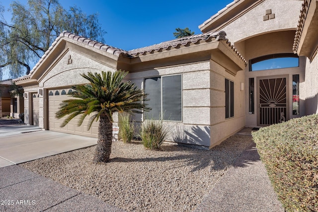 view of front of property with a garage