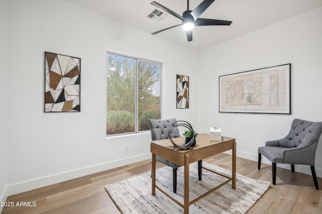 1029 E Ian Dr, Phoenix, AZ 85042 - office space featuring baseboards, ceiling fan, and light wood-type flooring