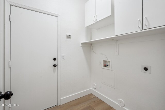 1029 E Ian Dr, Phoenix, AZ 85042 - washroom featuring hookup for an electric dryer, hookup for a gas dryer, light wood-style floors, cabinet space, and hookup for a washing machine