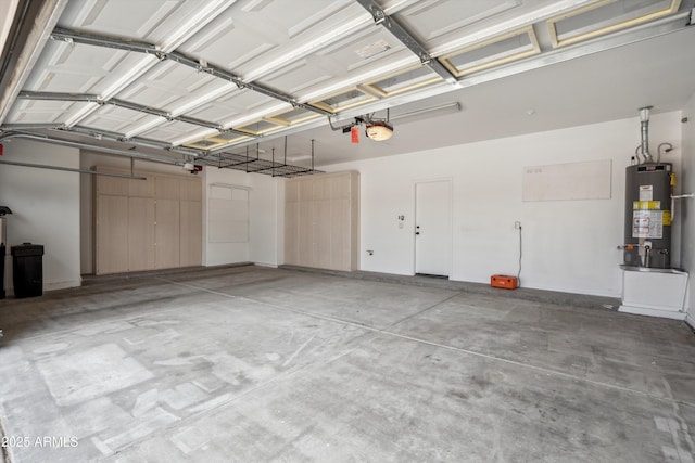 1029 E Ian Dr, Phoenix, AZ 85042 - garage featuring water heater and a garage door opener