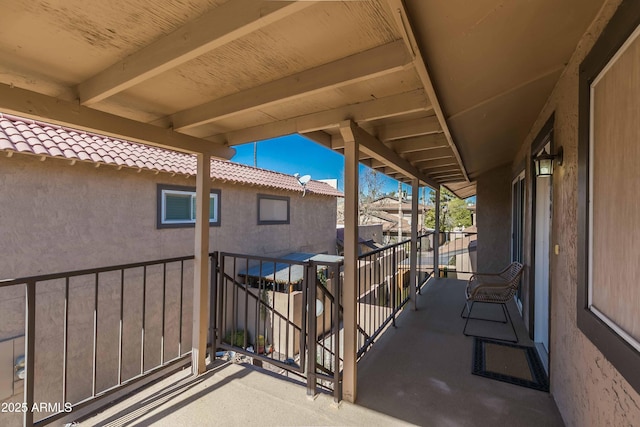 view of patio / terrace with a balcony