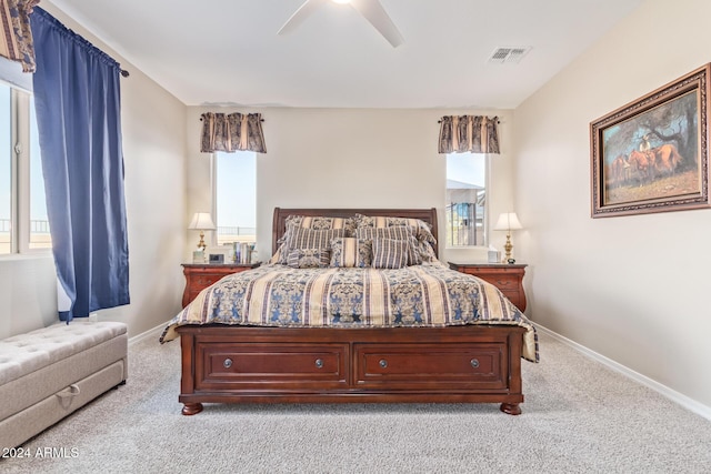 carpeted bedroom with ceiling fan