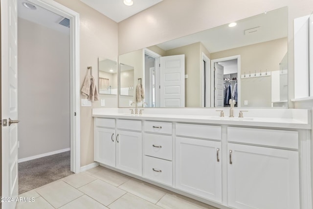 bathroom with vanity and tile patterned floors