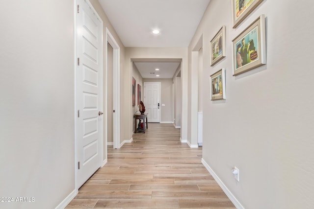 hallway featuring light wood-type flooring