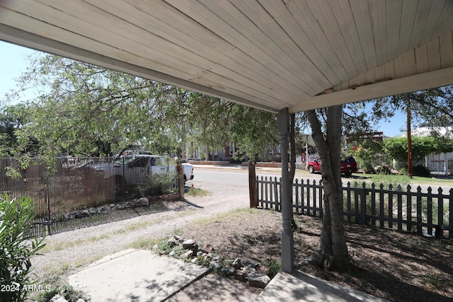 view of patio featuring fence