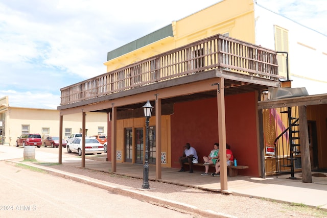 view of property with uncovered parking