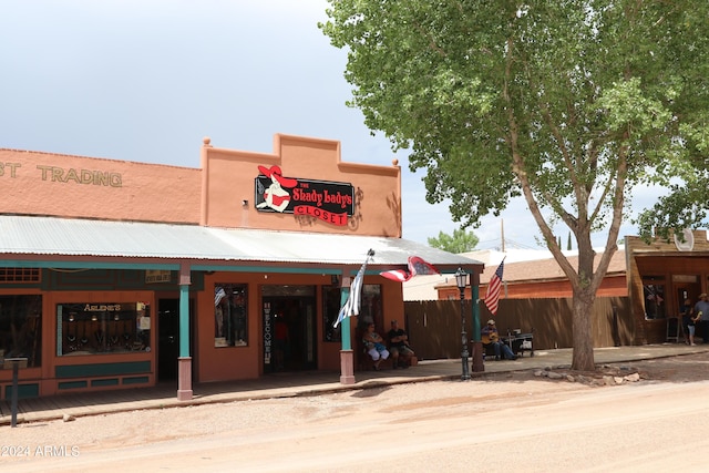 view of building exterior featuring fence