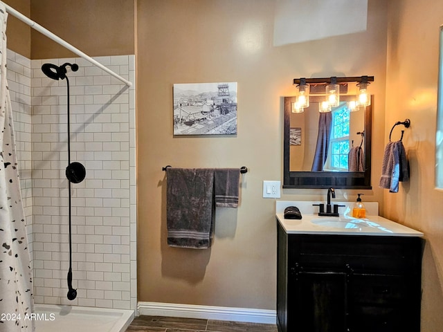 bathroom featuring vanity, a shower with curtain, and hardwood / wood-style floors