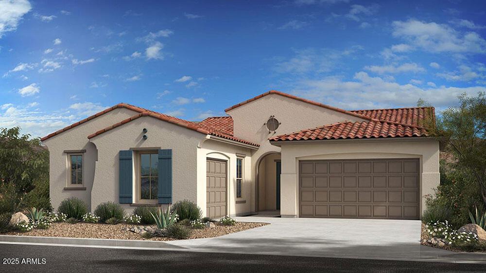 20705 W San Miguel Ave, Buckeye, AZ 85396 - mediterranean / spanish home with a tile roof, concrete driveway, a garage, and stucco siding