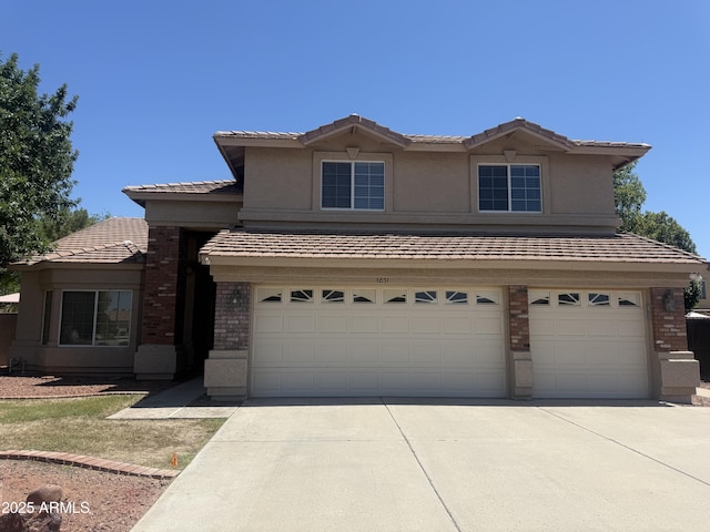 1831 W Armstrong Way, Chandler, AZ 85286 - traditional home with a garage, brick siding, driveway, and a tiled roof