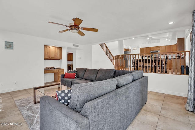 1831 W Armstrong Way, Chandler, AZ 85286 - living room featuring ceiling fan, stairway, light tile patterned flooring, and recessed lighting
