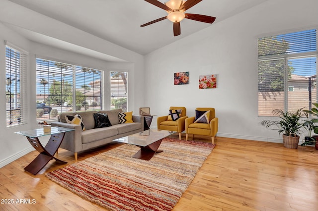 1831 W Armstrong Way, Chandler, AZ 85286 - living room with wood finished floors, ceiling fan, and high vaulted ceiling