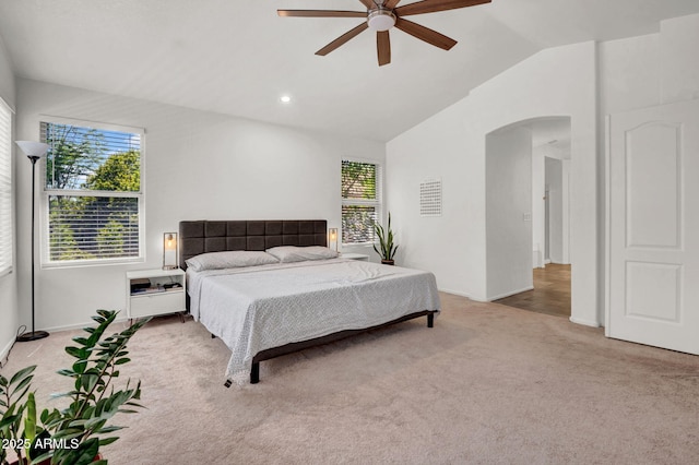 1831 W Armstrong Way, Chandler, AZ 85286 - carpeted bedroom featuring arched walkways, lofted ceiling, and ceiling fan