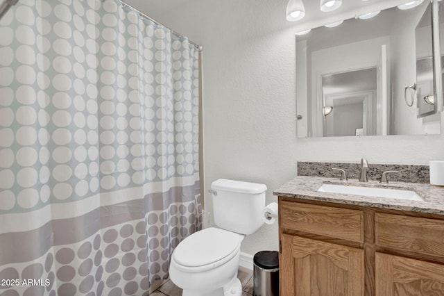 1831 W Armstrong Way, Chandler, AZ 85286 - bathroom with vanity, a textured wall, and curtained shower