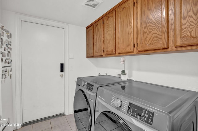 1831 W Armstrong Way, Chandler, AZ 85286 - laundry area featuring separate washer and dryer, cabinet space, and light tile patterned floors