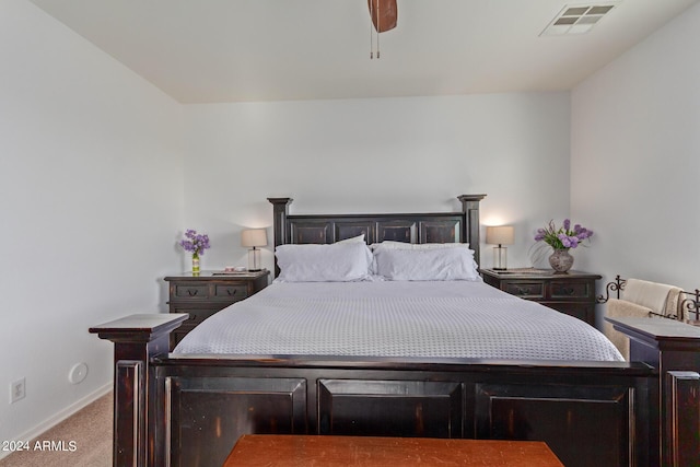 bedroom with carpet floors, baseboards, and a ceiling fan