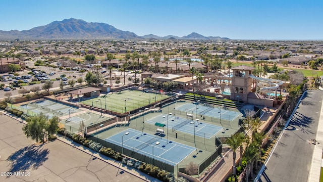 birds eye view of property featuring a mountain view