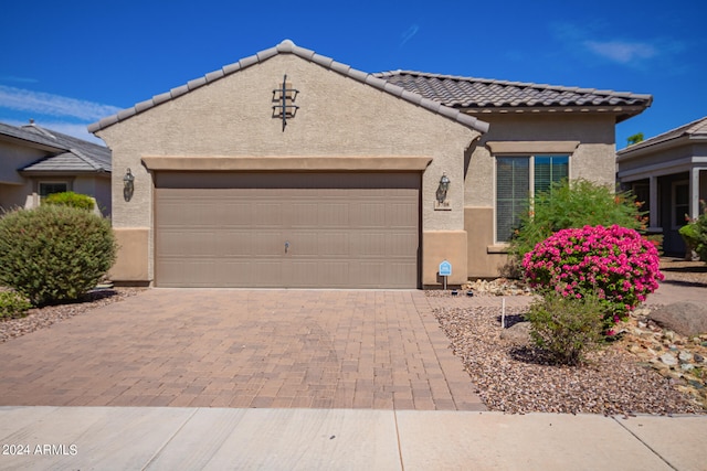 view of front of home with a garage