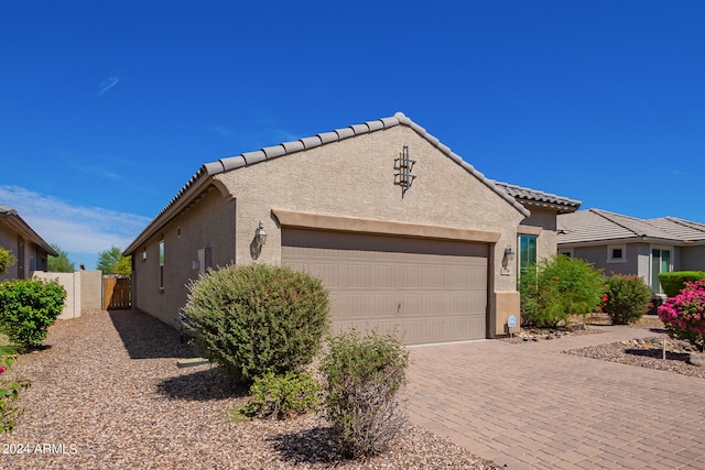 view of front of house with a garage