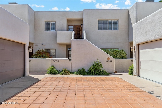 adobe home with a garage