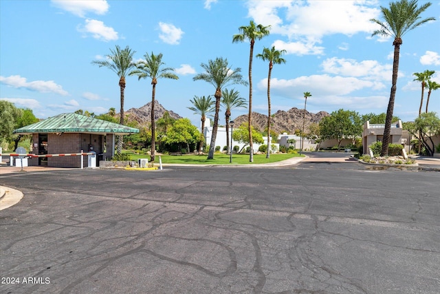 view of street with curbs and a mountain view