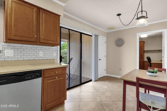 kitchen featuring light tile patterned floors, brown cabinetry, light countertops, dishwasher, and crown molding